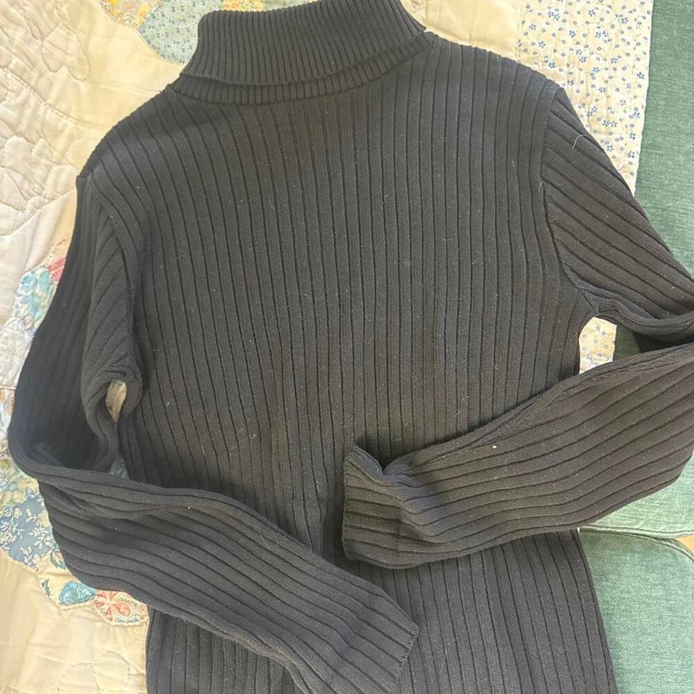 Black ribbed knit turtleneck sweater